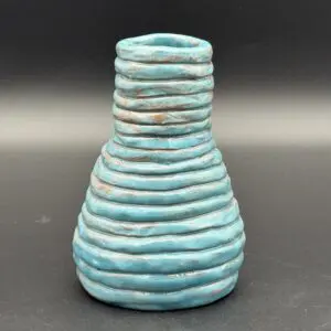 Artistic blue pottery with textured layers