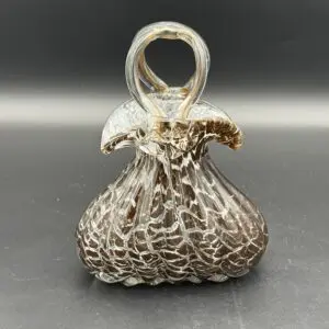 Decorative glass vase on black background