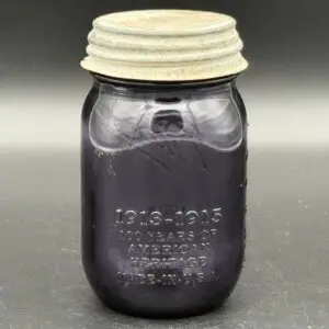 Purple vintage jar with metal lid