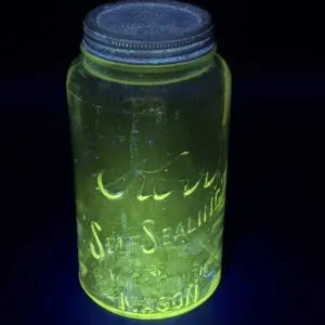 Fluorescent mason jar under black light